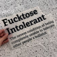 Bügelbild Fucktose Intolerant groß in Schwarz, ca. 30 x 19 cm, in der Hand gehalten