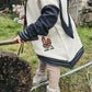 Bügelbild Hase keep calm auf einem hellen Kinderhoodie mit gestreiften Ärmeln (Beispielbild)