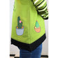 Bügelbild Kaktus Lotti auf grüner Jacke mit gestreiften Ärmeln, Detailansicht (Beispielbild)