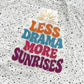 LESS DRAMA MORE SUNRISES auf einem Shirt aufgebügelt