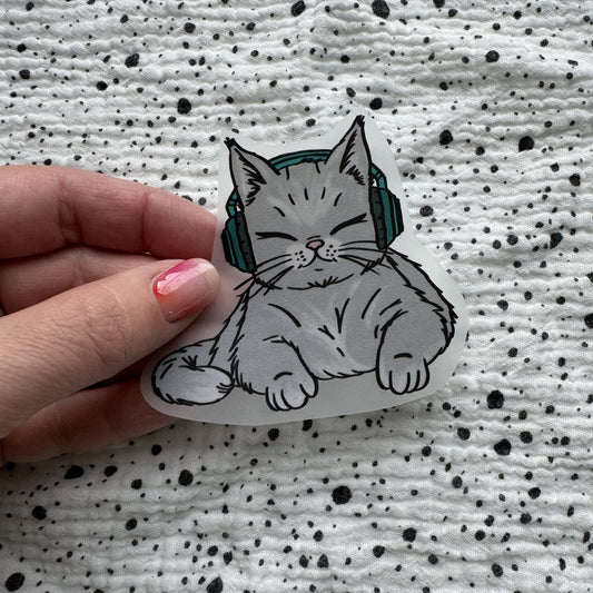 Bügelbild Music Cat Elsa klein – graue Katze mit Kopfhörern, in der Hand gehalten