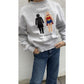 Bügelbild Super EmPower Nr. 1 auf grauem Sweatshirt zu Jeans (Beispielbild)