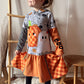 Freundlicher Geist – Geist und Karo-Kürbis als Applikation auf einem grau-orangefarbenen Kleid nach dem Schnittmuster Lottchen