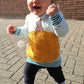 Herbst Applikation Bundle – großer Kürbis aus senfgelbem Waffeljersey appliziert auf einem hellblauen Kinder-Hoodie