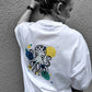 Frau von hinten im weißen T-Shirt mit Kraken der Plotterdatei Sea Life in bunter Glitzerfolie