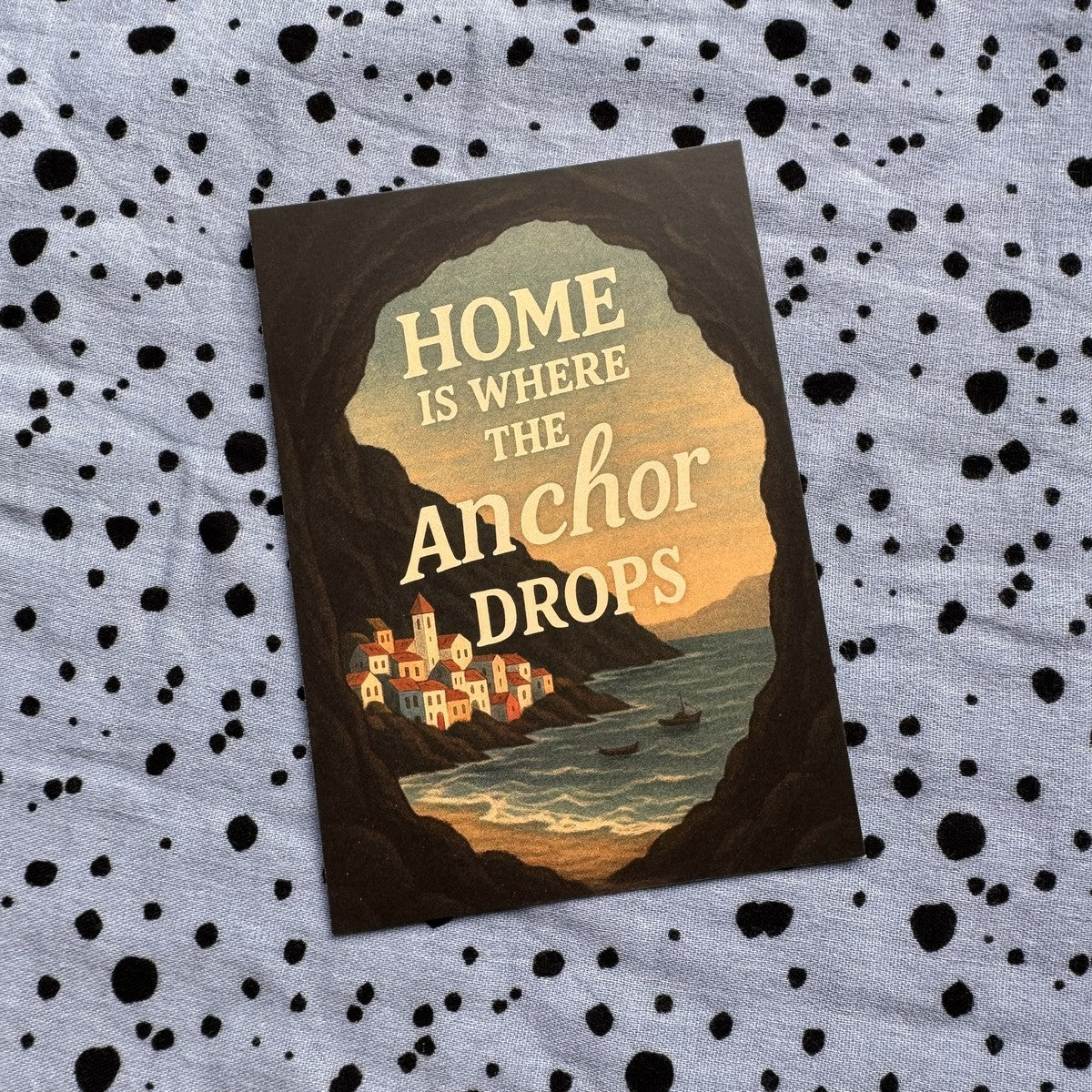 Postkarte Home is where the Anchor drops mit Blick aus einer Felsenhöhle auf eine Bucht