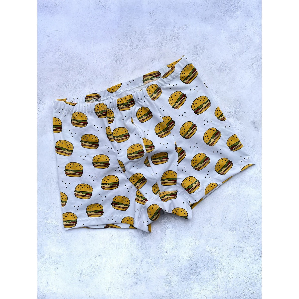 Herren Schlüppi Schnittmuster – weiße Boxershorts mit Burger-Print und eingeschlagenem, nicht sichtbarem Gummibund
