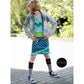 Schnittmuster Shabby Skirt Kids – petrolfarbener Birnen-Jersey mit grünem Bündchen und mintgrün gepunktetem Saumbündchen mit Spitze, dazu schwarze Katzen-Kniestrümpfe